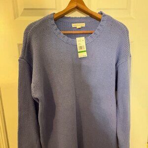 lavender knit sweater with a cozy, classic design